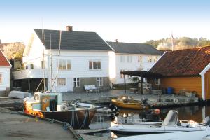 Ferienhaus Soløy direkt am Wasser